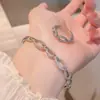 Conjunto de Pulseira e Anel Geométricos de Zircônia Personalizado e Fashion para Mulheres, com um Toque de Luxo Leve e Acabamento de Alta Qualidade, Conjunto de Pulseira Aberta