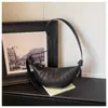 Bolso de textura de alta calidad para mujer, nuevo estilo 2025, moda, forma de albóndiga, media luna, bandolera, diseño de nicho, elegante, cuerno de vaca, bolso para mujer