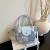 Bolsa de balde moderna e estilosa 2026 novo modelo, elegante e versátil, alto valor estético, pequena bolsa de mão, bolsa de ombro de grande capacidade