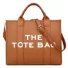 Bolsos de Mujer Comercio Exterior Transfronterizo Nuevo Bolso Tote con Letras de PU Bolso de Mano Casual Simple de Gran Capacidad Bolsos de Mujer Más Vendidos al por Mayor