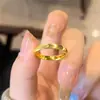 Anillo Antiguo de Ojo de Gato Dorado Brillante Anillo Sencillo Lujo Accesible Diseño de Nicho Anillo Sencillo Anillo de Pareja Nuevo Regalo