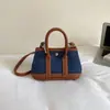 Bolso de Mano Coreano Elegante Bolso Cubo 2026 Nuevo de Moda Versátil Bolso Tote con Acabado de Lujo, Bolso de Hombro Cruzado