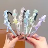 Diadema de concha de estrella de mar color macarrón con dientes antideslizante para niñas ambiente de playa accesorios para el cabello diadema infantil