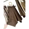 Elegante saia de camurça assimétrica em estilo retrô para mulheres, nova coleção outono/inverno, cintura alta, saia evasê que afina o corpo com barra flare