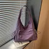 Bolso de mano transfronterizo simple de gran capacidad, nuevo bolso de hombro de moda versátil para el otoño de 2026, bolso de mano ligero para el día a día