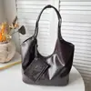 Nova bolsa outono de 2026, bolsa de balde cor sólida vintage, bolsa de mão simples, bolsa de ombro sob o braço moderna e descontraída