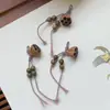 Venta al por mayor madera de durazno natural dosel de loto pequeño sándalo verde pulsera diy colgante ropa ropa colgante para teléfono móvil productos semiacabados