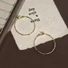 Aretes de Aro con Hilo Metálico 2025 Nuevo Estilo Caliente Aretes de Moda Lujo Accesible de Alta Gama Aretes Personalizados