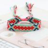 Joyería transfronteriza Nepal Pulsera tejida a mano Borla Arcoíris Suerte Tránsito Pulsera de la amistad Estilo étnico Cuerda de mano