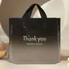 Bolsa de plástico al por mayor de fábrica, bolso de tienda de ropa, bolso de tienda de ropa para mujeres y niños, bolsa de regalo, bolsa de embalaje engrosada