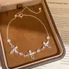 Pulsera de flor corazón de circón súper brillante estilo coreano, sensación de lujo ligero de alta gama, joyería versátil exquisita y elegante para el día a día de las mujeres