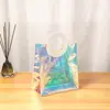 Bolsa de Mão Transparente PVC a Laser Cor Roupas Sacola de Compras Plástico Maquiagem Bolsa Mágica de Presente de Celebridade da Internet