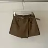Calça-Saia de Couro Minimalista Estilo Coreano Justa ao Corpo Outono 2026 Nova Versátil Emagrecedora Cor Sólida Irregular Calça-Saia