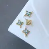 Accesorios para Joyería DIY Zirconia Microincrustada que Conserva el Color Trébol de Cuatro Hojas Colgante Doble Pendientes Pasador Materiales DIY