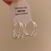 Pendientes geométricos de círculo plateados estilo coreano para mujer, pendientes minimalistas de nicho de alta gama, pendientes de aro lisos elegantes