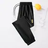 Calça Masculina de Seda Gelo Secagem Rápida Verão Estilo Fino Jogger Elástica Respirável Solta Tamanho Grande para Corrida ao Ar Livre Esportes