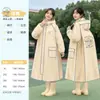 Impermeable de una pieza Zhengyu para niños de primaria Poncho de lluvia a prueba de tormentas de cuerpo completo de EVA con mochila integrada y engrosada