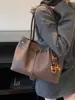Bolso de hombro versátil de gran capacidad transfronterizo para mujer, nuevo bolso de compras casual de otoño 2026, bolso tote texturizado para el trabajo