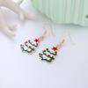 Aretes de Navidad Aretes de botón de Navidad Copo de nieve Año Nuevo Dibujos animados Árbol de Navidad Aretes colgantes Lote mixto Elementos navideños