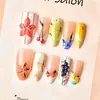 30 piezas de uñas postizas de moda transfronteriza, con diseño floral 3D, forma de almendra, piezas de arte de uñas de cereza exquisitas, en stock para venta al por mayor