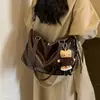 2026 Bolsa Transversal Grande Capacidade Retrô Nova Feminina para o Dia a Dia Bolsa de Ombro Couro Macio Casual Versátil Bolsa de Mão Simples