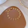 [Acero de titanio de cuerpo entero] Dongdaemun personalidad láser Cadena ovalada personalidad nariz de cerdo pulsera femenina Red social retro Amigas