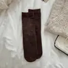 Nuevos Calcetines de Mujer Versátiles Sin Costuras de Canalé de Color Sólido Micro-Presión Otoño/Invierno Venta al por Mayor Calcetines Caídos de Media Pantorrilla Color Café Algodón