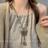 Estilo Étnico Retro Hecho a Mano Cerámica Mariposa Colgante Collar Mujer Nuevo Nuevo Chinoiserie Cadena Larga de Perlas Accesorios para Sudadera
