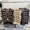 Suministro Directo de Fábrica Cárdigan de Punto Hueco con Cuello en V para Mujer Camiseta de Manga Corta a Rayas de Bloques de Color Fuente de Suministro de Tienda Física Guangzhou Shisanxing