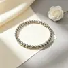 Moda INS europea y americana simple y moderna joyería de mano, pulsera de cuentas de acero inoxidable de lujo ligero, chapado en oro de 18 quilates, 6 mm