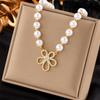 Nuevo estilo francés retro nicho diamante flor perla collar pendientes pulsera traje de alta calidad clavícula cadena joyería