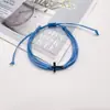 Pulseira Europeia e Americana Transfronteiriça de Cera Tecida à Prova d'Água para Homens e Mulheres Corda de Mão da Amizade Pulseira Cruzada para Praia Surfe