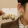 Set de Aretes Geométricos Dorados Estilo Europeo y Americano Transfronterizo, Pendientes de Moda y Versátiles para Mujer, Combinación de Pendientes de Lujo y Aretes de Botón