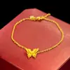 Livro Vermelho de Chapéu com Pulseira de Borboleta de Pena Dourada Romântica Inteligente 2024 Nova Moda Combinação Joias de Luxo