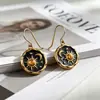 Yanbai Venta Caliente Transfronteriza Pendientes Colgantes Verano Bohemio Retro Aceite Negro Goteando Retro Exquisito Sol Luna
