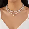 Moda Europeia e Americana High-End Colar de Pérolas de Imitação Multicamadas Feminino Moda Elegante Pingente de Coração com Laço Corrente para Clavícula