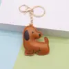 Llavero creativo de perro para coche con impresión a doble cara, colgante para mini bolso para hombres y mujeres, exquisito accesorio de llavero de cachorro