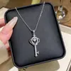 Collar con colgante de llave de acero de titanio con incrustaciones de circonita estilo coreano para mujer, exquisita cadena para la clavícula totalmente pavimentada con diamantes súper brillante, accesorio elegante