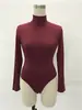 Mono ajustado sexy de cuello alto europeo y americano de manga larga para mujer, top de moda, mono ajustado de color sólido para mujer