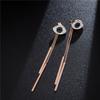 Moda japonesa y coreana Pendientes de botón Ojo de Diablo de Diamante acero de titanio oro rosa borla pendientes de doble uso al por mayor
