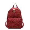 Mochila Pequena Estampa de Leopardo Modelo Novo 2026 Versátil Casual para Viagem Moda para Mulheres Mochila Escolar Casual e Simples