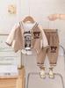 Traje de otoño para niño 2024, nuevo traje de béisbol de dibujos animados de primavera y otoño para bebé, ropa de moda de estilo occidental de tres piezas para bebé.