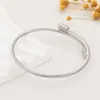 Pulseira de Aço Inoxidável Banhada a Ouro Real, Mais Vendida Transfronteiriça, Cor Dourada e Prateada, Não Desbota, Pulseira de Aço Titanium com Fio de Aço Torcido da Moda