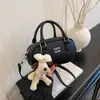 Diseño de Nicho Bolsa de Bowling de Mano 2026 Nueva Bolsa de Trabajo para Mujer Commute Tacto de Alta Gama Lujo Ligero Bolso Cruzado