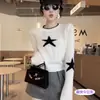 Top de punto lindo estilo coreano con mangas de campana y estampado de estrellas, una pieza nueva y de moda para mujer