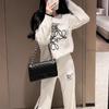 Conjunto de Tricô Bordado de Gola Redonda de Duas Peças para Mulheres Outono e Inverno Nova Moda Suéter Solto Casual Conjunto de Calças de Perna Larga
