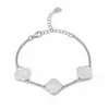 Nuevo Conjunto de 2 Piezas Pulsera y Collar de Flor de Acero de Titanio para Mujer Moda de Lujo Ligero Joyería de Cadena para Clavícula No se Desvanece Venta al por Mayor