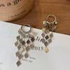 Pendientes de borlas de diamantes dorados estilo dorado para mujer, largos, exagerados, ligeros, de lujo, de alta gama, con sentido retro.