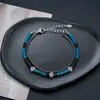 Pulsera de doble capa con cristal azul marino en forma de cruz, un accesorio de moda y versátil tanto para hombres como para mujeres, adecuada para el uso diario y para añadir un toque de lujo discreto.