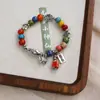 Accesorios Pequeños Más Vendidos para Puestos de Año Nuevo, Pulseras de Cerámica con Hilo Rojo, Cuerdas para la Mano, Joyería, Cuerdas para la Mano del Festival de Primavera, Venta al Por Mayor Directamente del Fabricante